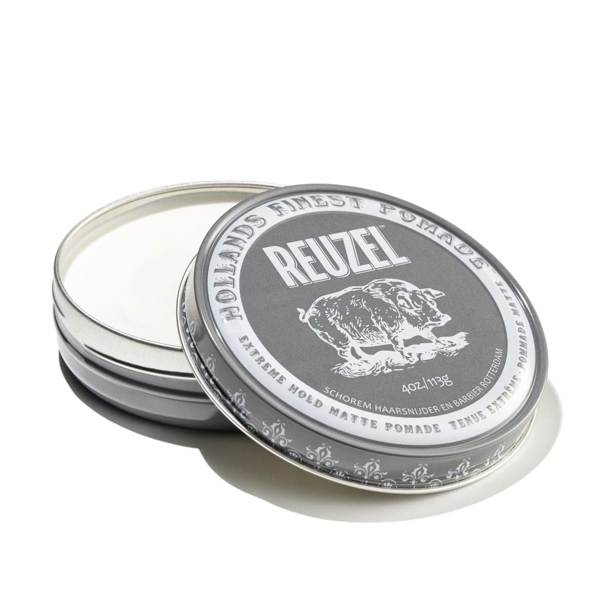 Reuzel Deutschland Extreme Hold Matte Pomade jar showing black container with product label and matte finish.
