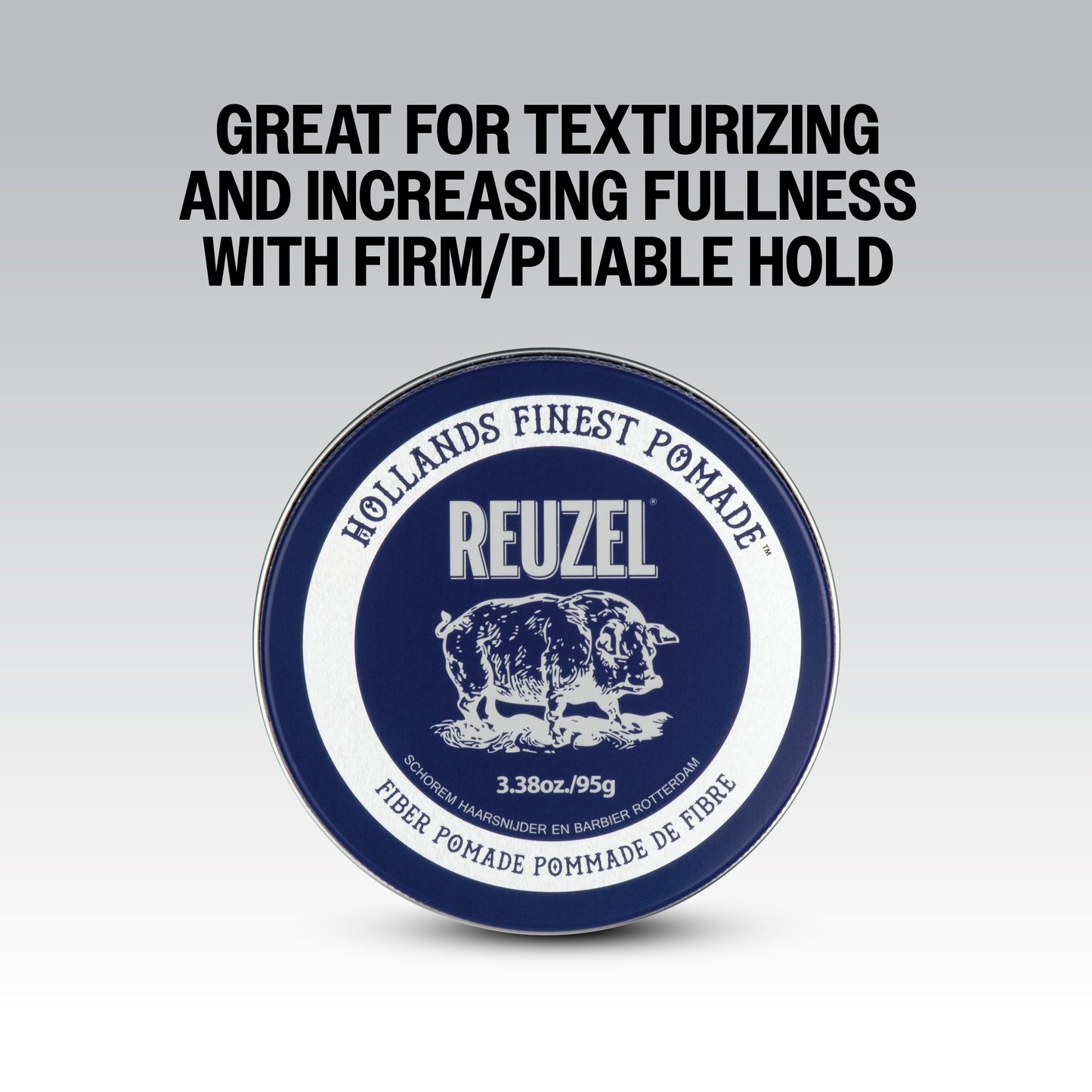 Reuzel Fiber Pomade jar with black lid and label, showing its thickening hair styling product for textured hairstyles.