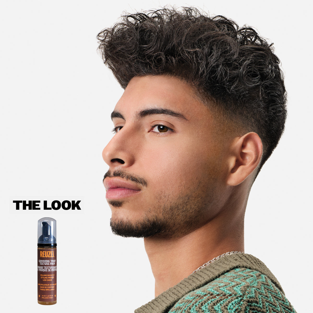 Reuzel Deutschland Grooming Tonic Texture Foam for hair styling, showing the foam bottle with a sleek design and product label.