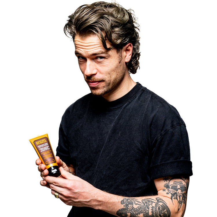Reuzel Deutschland Grooming Tonic Texture Cream for hair styling, showing the jar and product label on a white background.