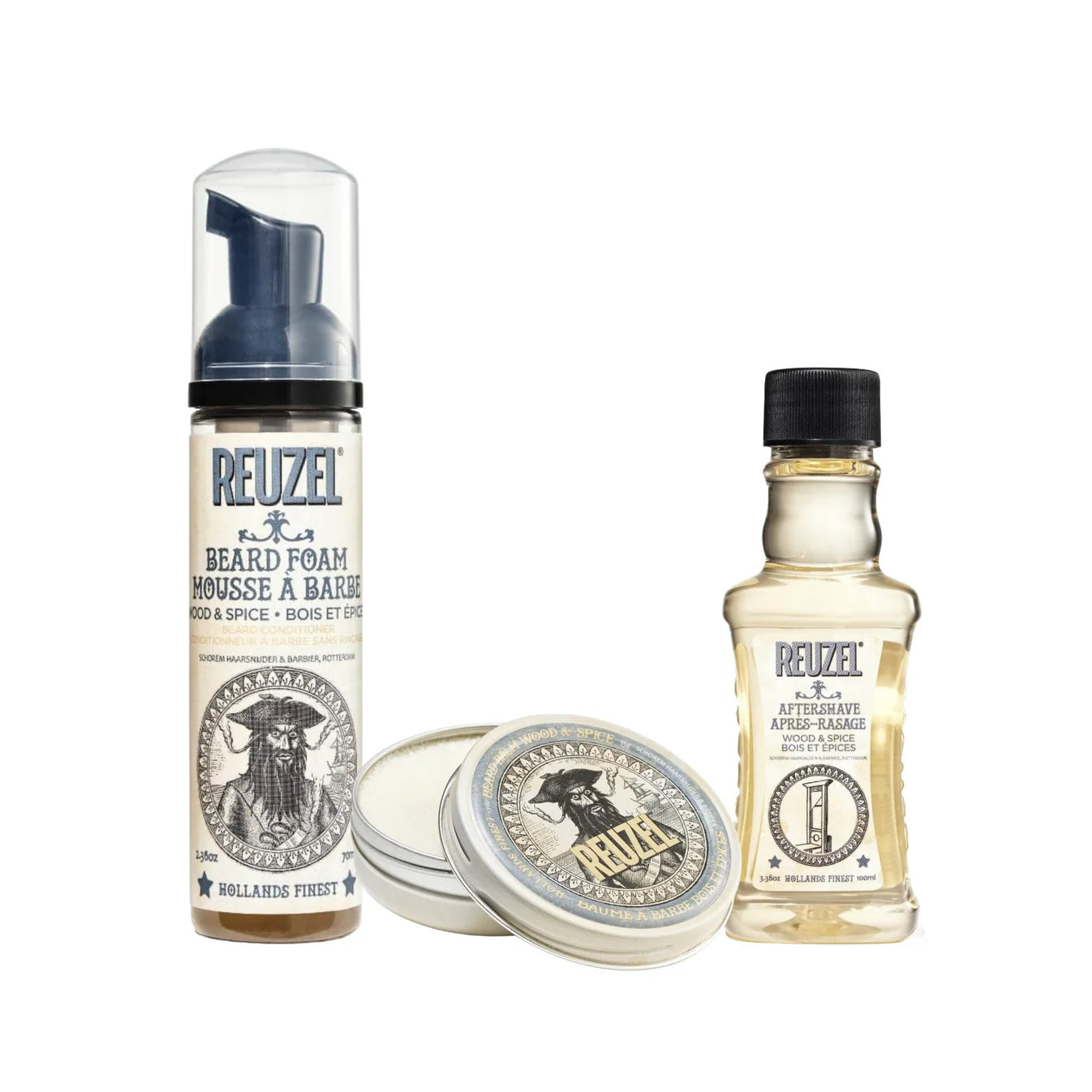 Reuzel Deutschland Wood & Spice Beard Bundle with beard oil, balm, and grooming accessories on a wooden surface.