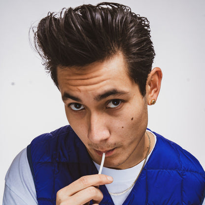 Reuzel Deutschland textured hair care bundle with pomade, featuring a jar of styling pomade and textured hair products.