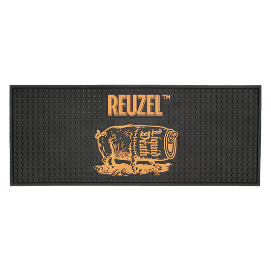 Reuzel Liquid Death Barber Mat featuring a graphic severed head design, ideal for barber shops and grooming stations.