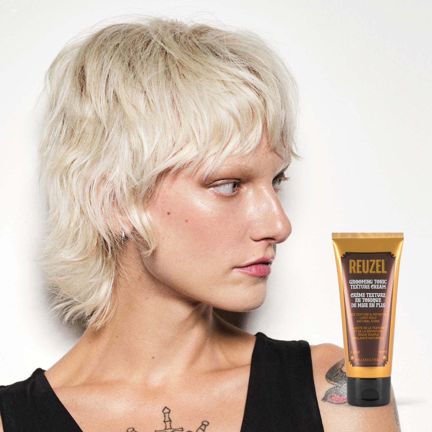 Reuzel Deutschland Grooming Tonic Texture Cream in a jar, showcasing its smooth, creamy hair styling product for textured looks.