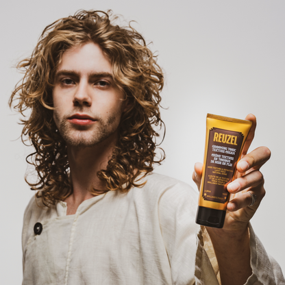 Reuzel Deutschland Grooming Tonic Texture Cream in a jar, showing the cream's smooth, thick texture for hair styling.