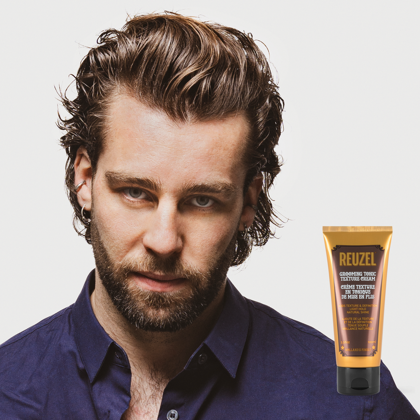 Reuzel Deutschland Grooming Tonic Texture Cream in a jar, styling hair with a matte finish and flexible hold.