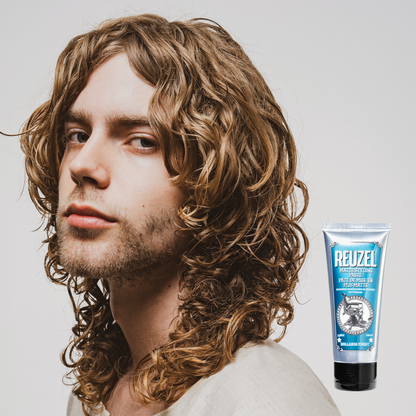 Reuzel Deutschland grooming cream for hair styling, shown in a sleek jar, perfect for shaping and managing hair.