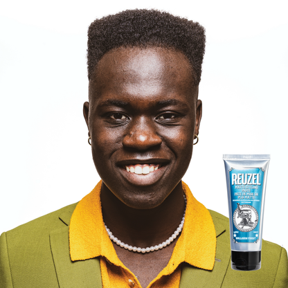 Reuzel Deutschland Grooming Cream for hair styling, showing a jar of grooming cream with a dark container and white label.