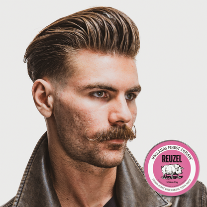 Reuzel Deutschland Pink Pomade jar with pink label and lid, ideal for styling hair with a strong hold and shiny finish.
