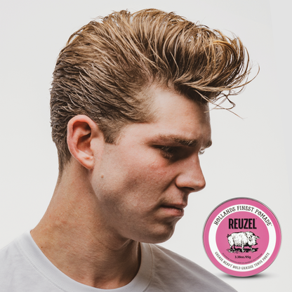 Reuzel Pink Pomade jar with pink lid and label, classic styling product for men’s hair grooming.