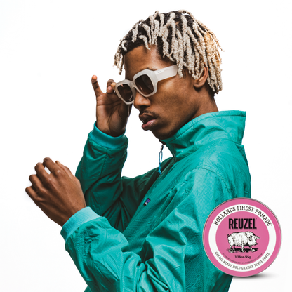 Reuzel Pink Pomade jar with pink lid and label, showcasing the styling product for hair grooming and hold.