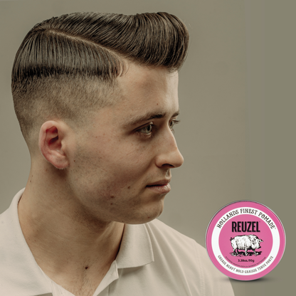 Reuzel Pink Pomade jar showcasing the classic pink label and lid, ideal for styling and shaping hair with a glossy finish.