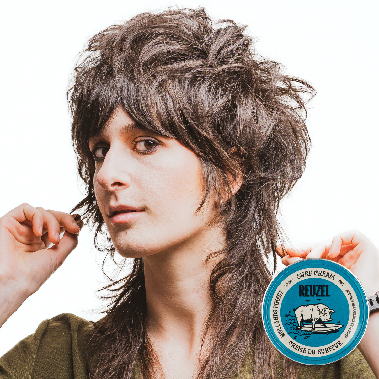 Reuzel Deutschland Surf Cream pomade jar with label, showcasing the hair styling product for textured, beach-inspired hairstyles.