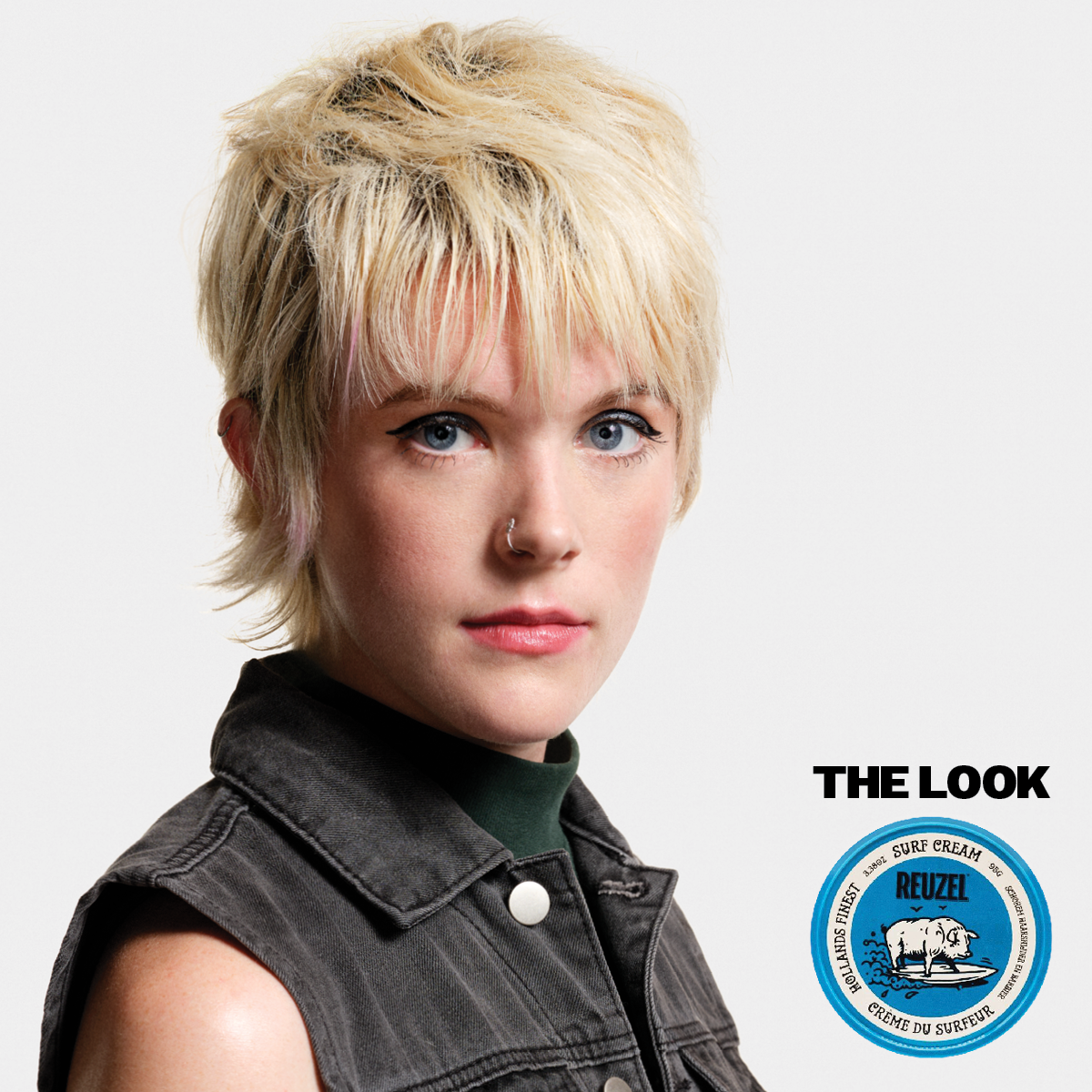 Reuzel Deutschland Surf Cream pomade in a jar, showing the product's textured cream consistency and label on the packaging.