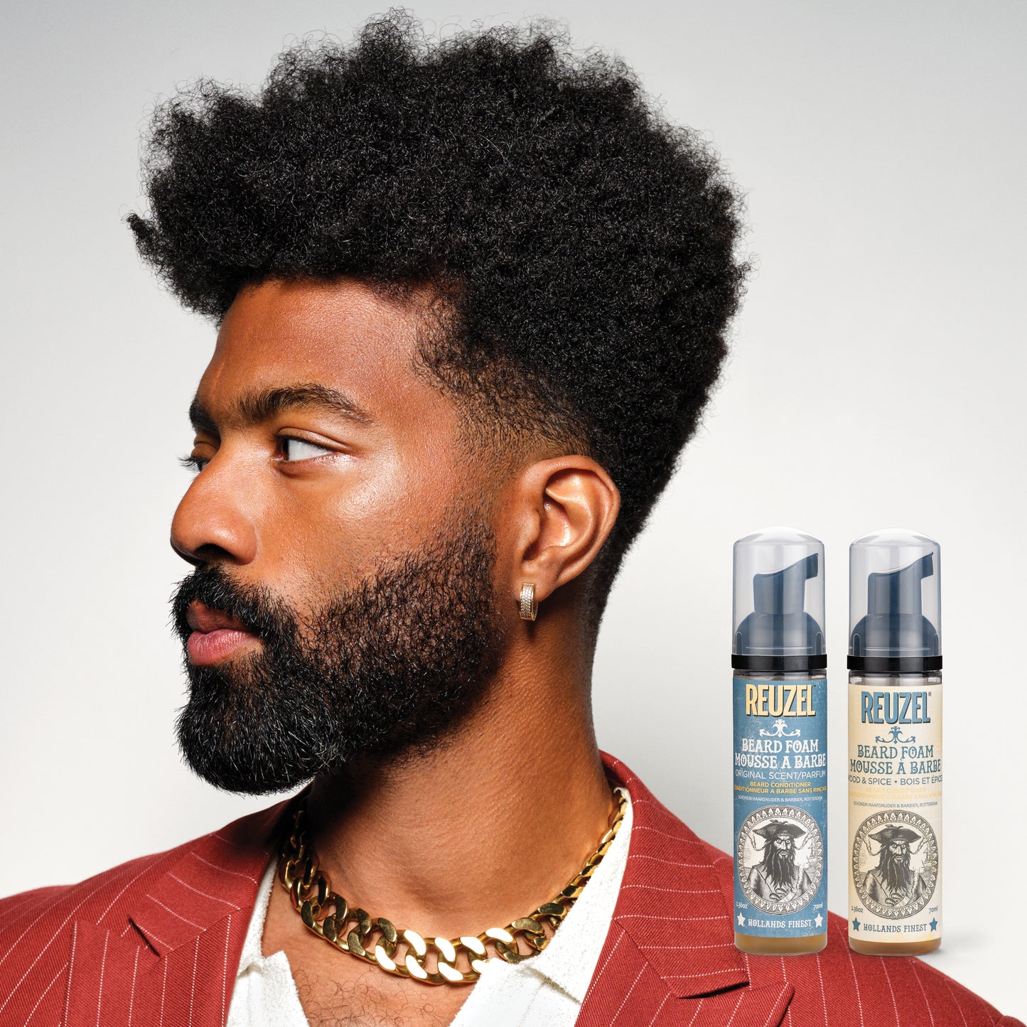 Reuzel Deutschland beard foam in a container, designed for grooming beards with a lightweight, nourishing formula.