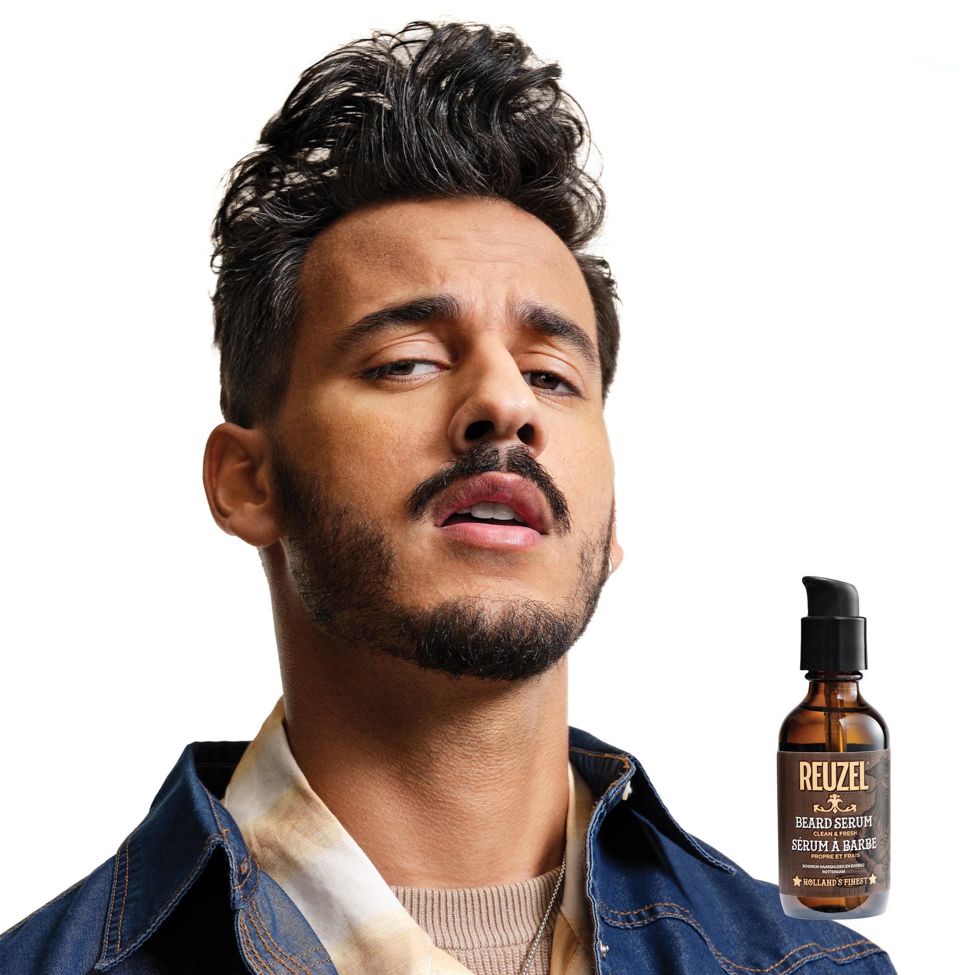 Reuzel Deutschland Clean & Fresh Beard Serum in a bottle, designed to nourish and soften men's beard hair.