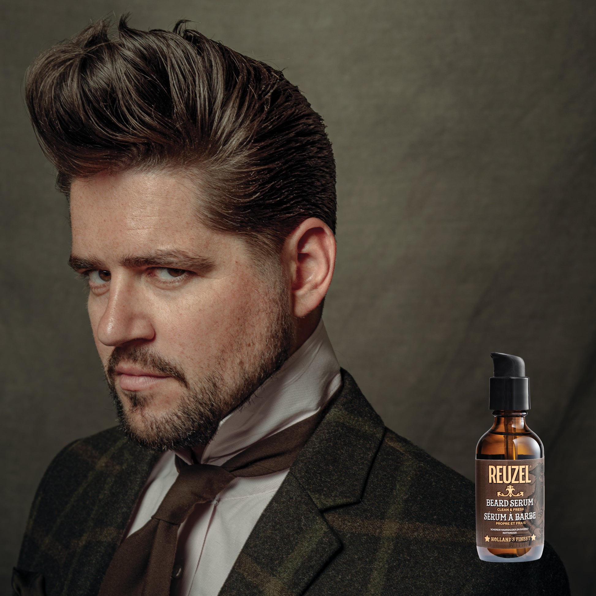 Reuzel Deutschland Clean & Fresh Beard Serum bottle with dropper, beard grooming product for healthy, refreshed facial hair.