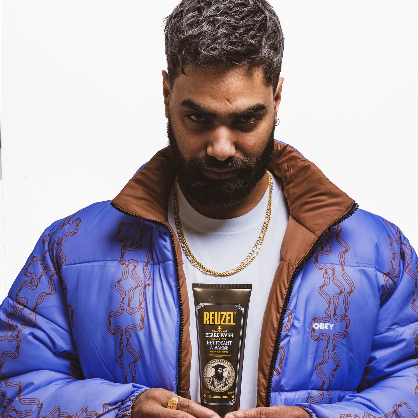 Reuzel Deutschland Clean & Fresh Beard Wash bottle with label, designed for grooming beards and maintaining clean facial hair.