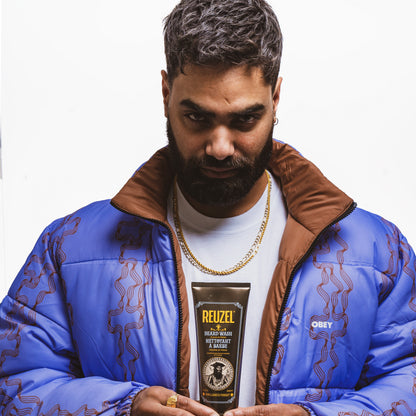 Reuzel Deutschland Clean & Fresh Beard Wash bottle with label, designed for grooming beards and maintaining clean facial hair.