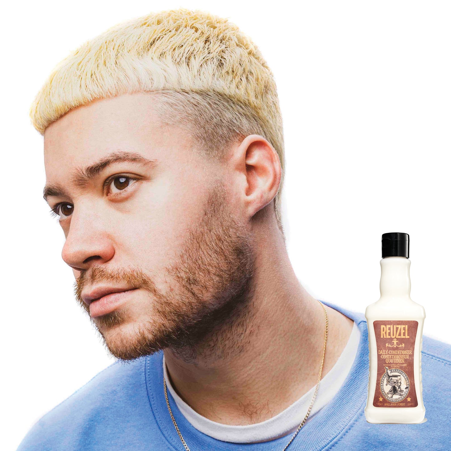 Reuzel Deutschland Daily Hair Conditioner bottle, creamy formula, with pump dispenser, designed for nourishing and moisturizing hair.