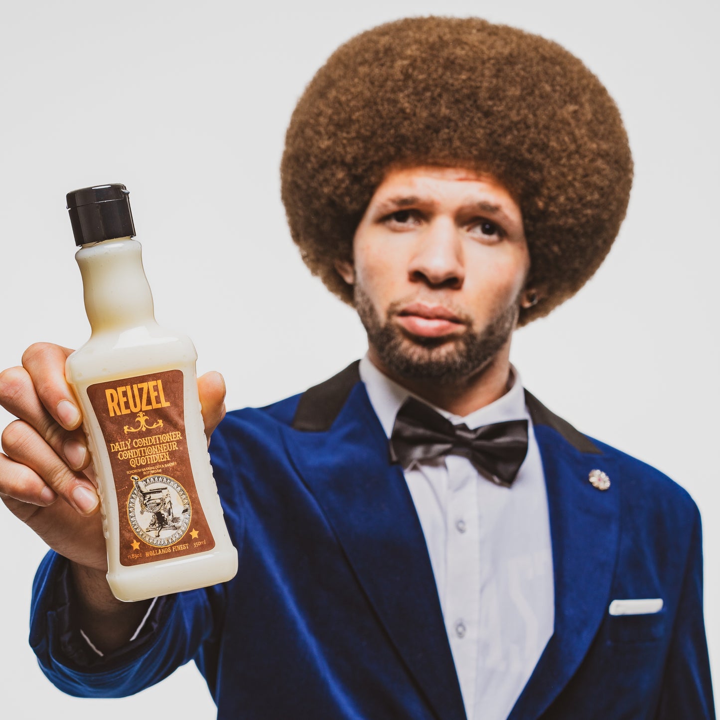 Reuzel Deutschland Daily Hair Conditioner bottle, smooth and hydrating conditioner for everyday hair care.