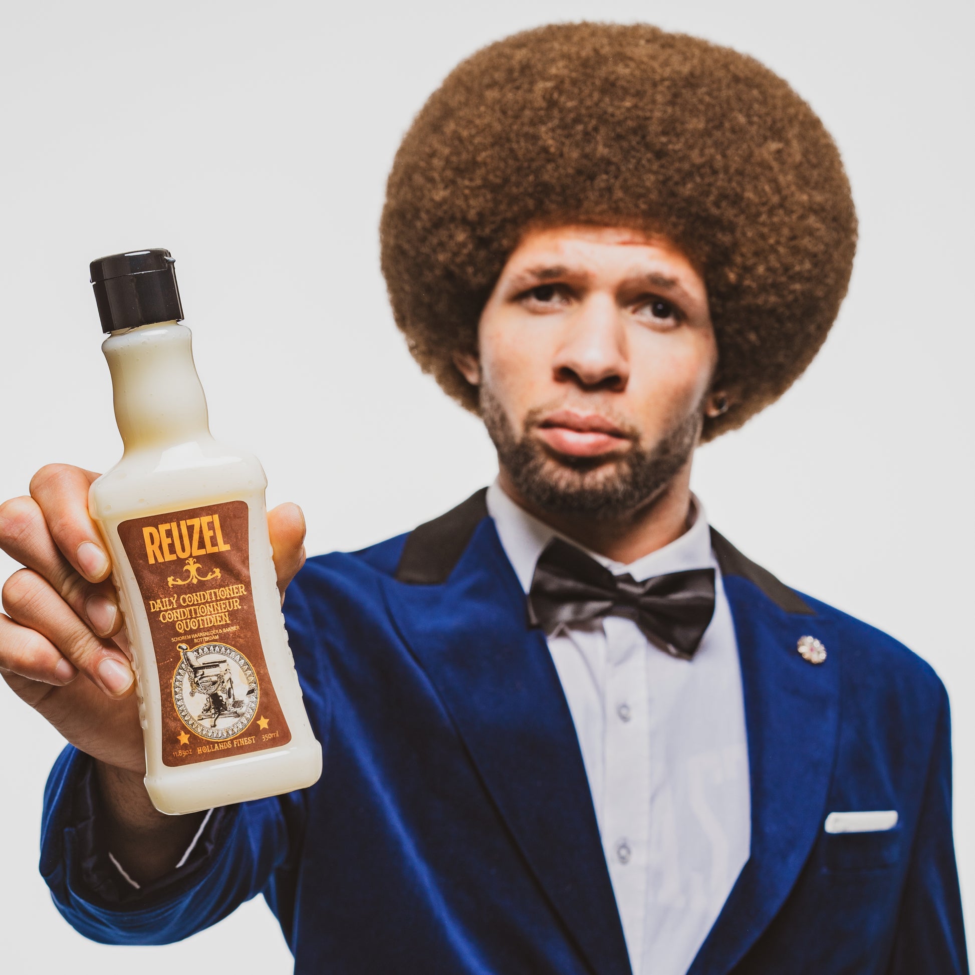 Reuzel Deutschland Daily Hair Conditioner bottle, smooth and hydrating conditioner for everyday hair care.