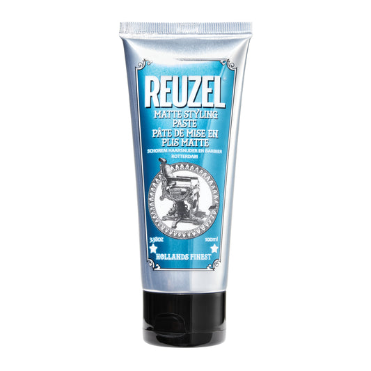 Reuzel Deutschland matte styling paste in a jar, showing the textured product and branding on the container for hair styling.