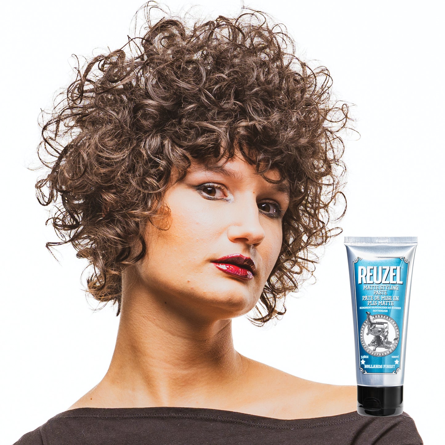 Reuzel Deutschland matte styling paste in a jar, showing the product's creamy texture for hair styling and hold.