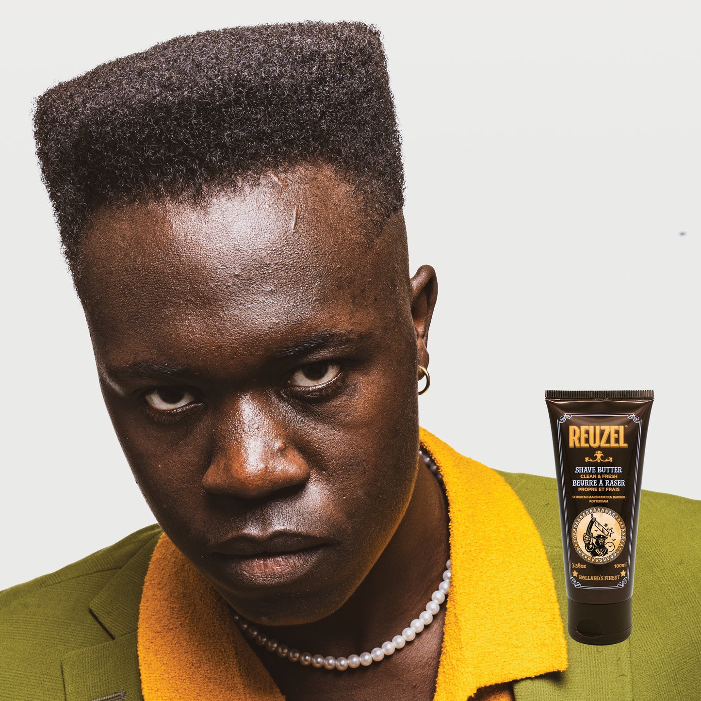 Reuzel Deutschland Clean & Fresh Shave Butter in a jar, featuring a smooth, creamy texture for comfortable beard grooming.