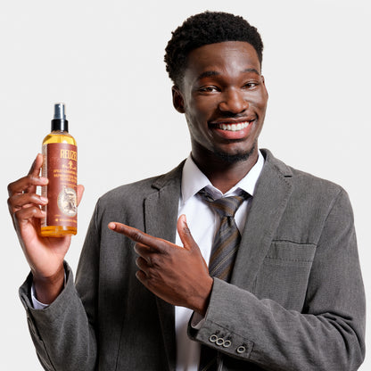 Reuzel Deutschland Spray Grooming Tonic in a spray bottle, designed for hair care and styling.