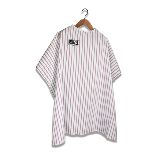 Reuzel Deutschland barber cape for salon use, lightweight black cloth with adjustable neck strap, designed for professional haircuts.